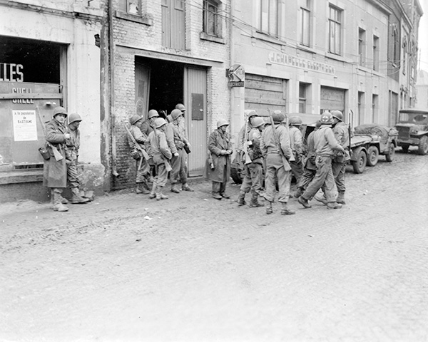 Soldiers from the 28th Infantry Division in Bastogne during the Battle of the Bulge, December 1944.