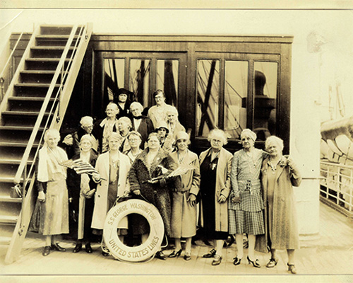 War Widows take photo on pilgrimage ship.