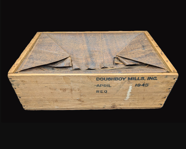 Another view of the waxed liner as well as markings dating the crate and manufacture.